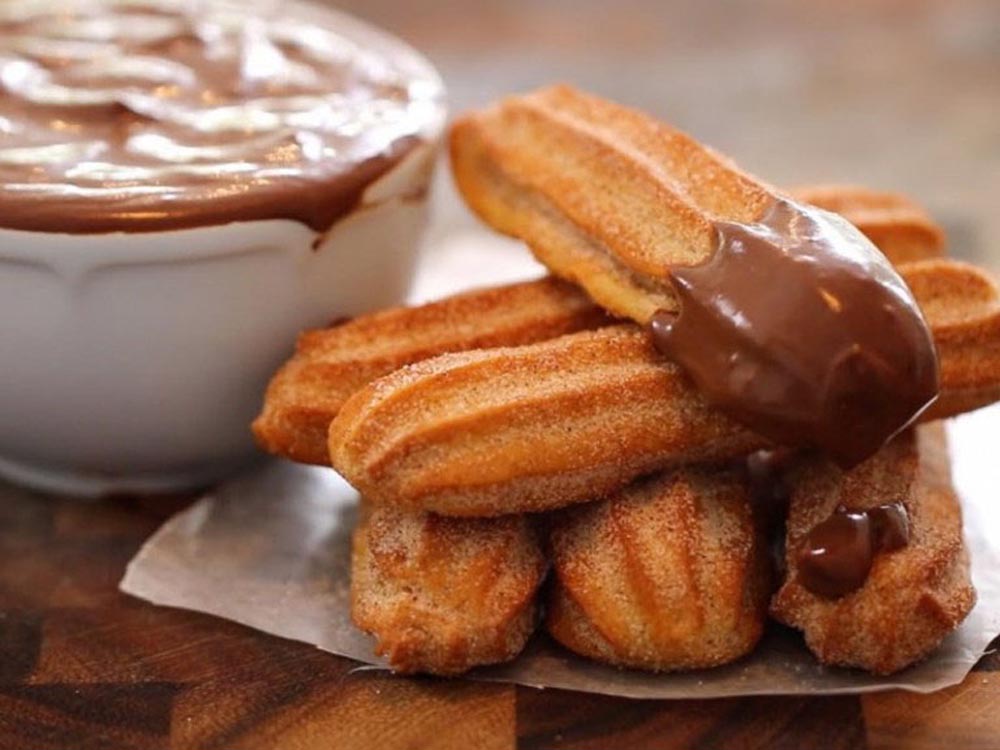Churros não são iguais: as diferenças entre a guloseima espanhola e a brasileira